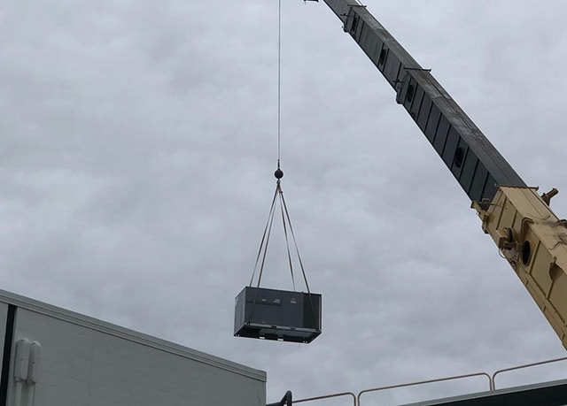 Crane Lift Industrial A.C. Rooftop Installation